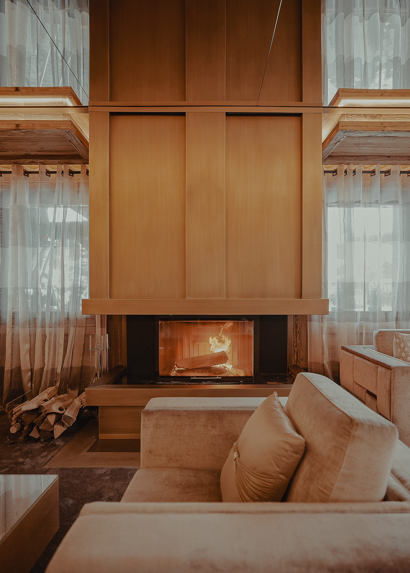 Ultima Hotel Gstaad fireplace lounge